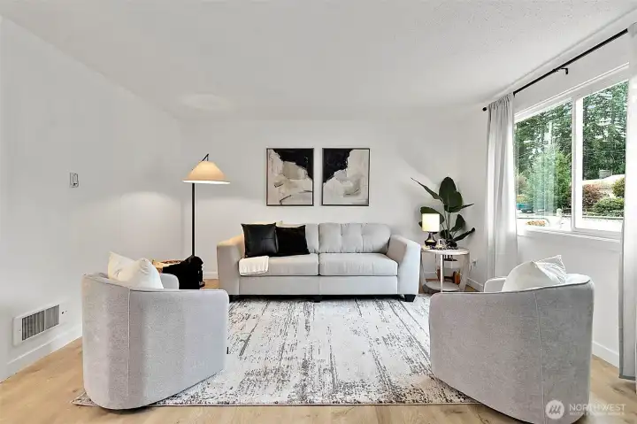 Bright and open living space with large windows and natural light.