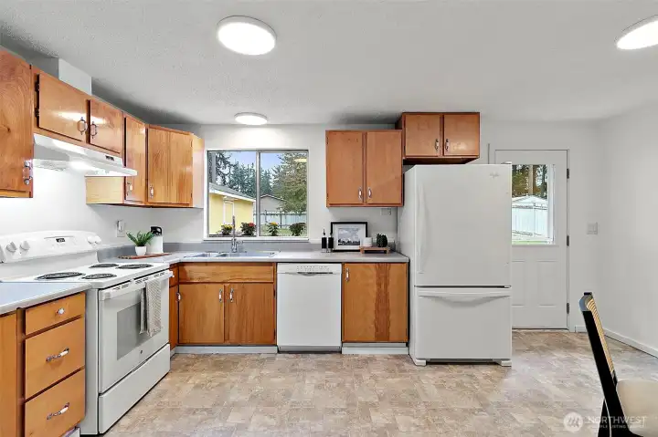 Classic wood cabinetry creates a warm touch.