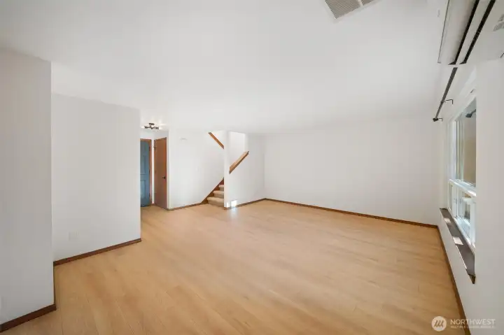 Another angle of the living room, looking toward the front door