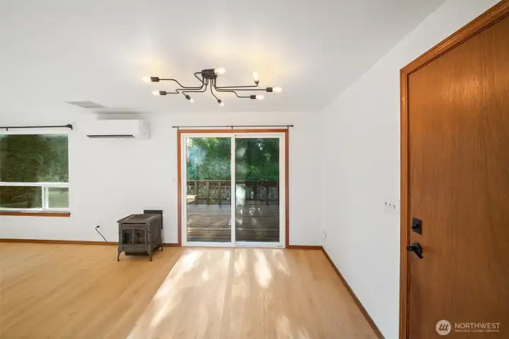 Dining room with a sliding door to the rear deck is great for entertaining