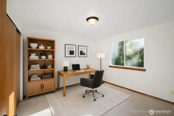 Bedroom #2, virtually staged here as an office. All new carpeting