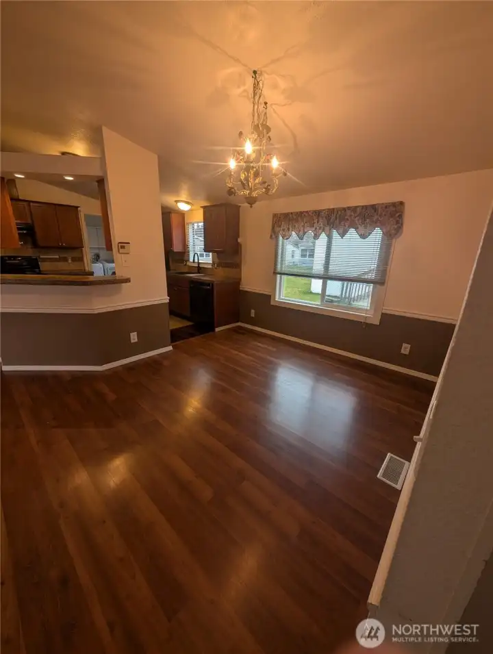 Dining room leading in to the kitchen.