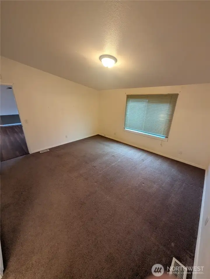 Primary bedroom with attached bathroom.