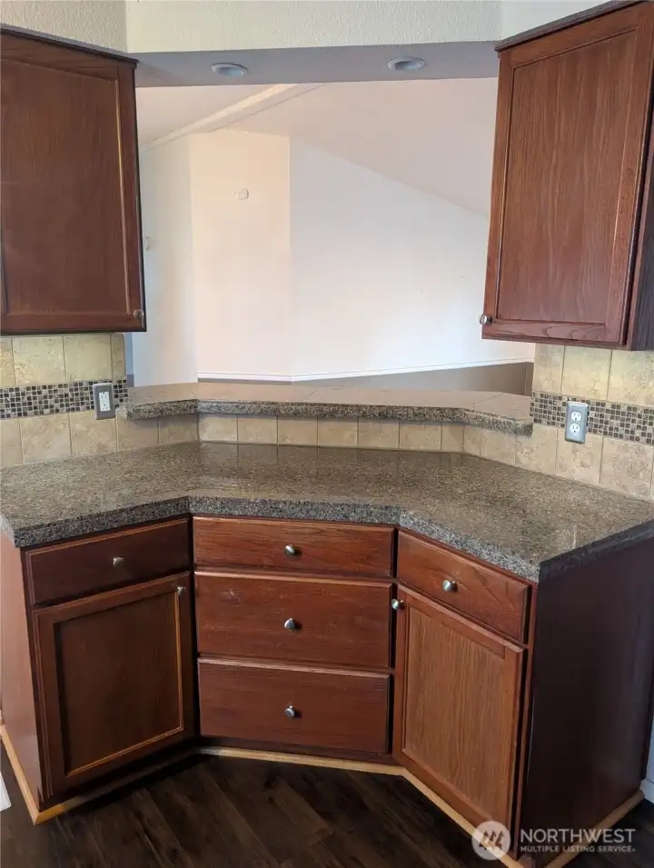 Kitchen looking out into the living and dining rooms.