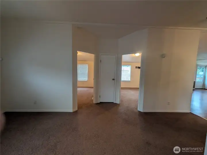Showing the 2 bedrooms side by side with a linen closet in between