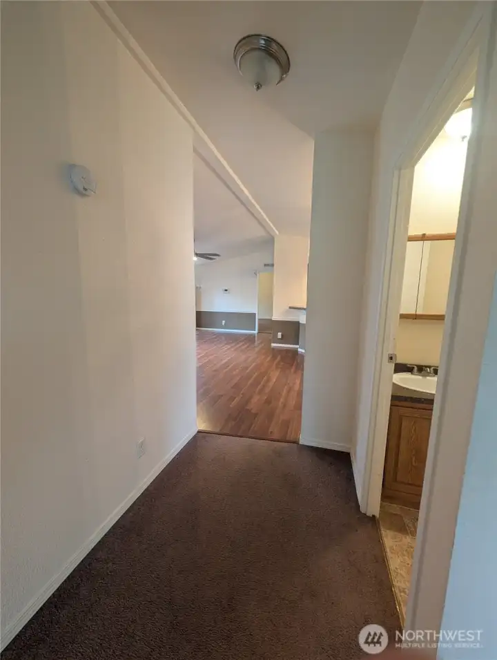 Showing the little hallway between the secondary living room and the main living room