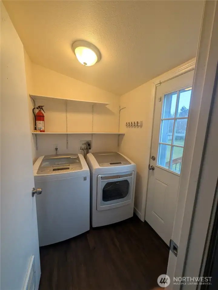 Laundry room off of kitchen. (Washer and dryer do not convey!)