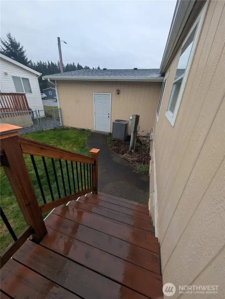 From back door in laundry room looking at the garage and it's exterior door.