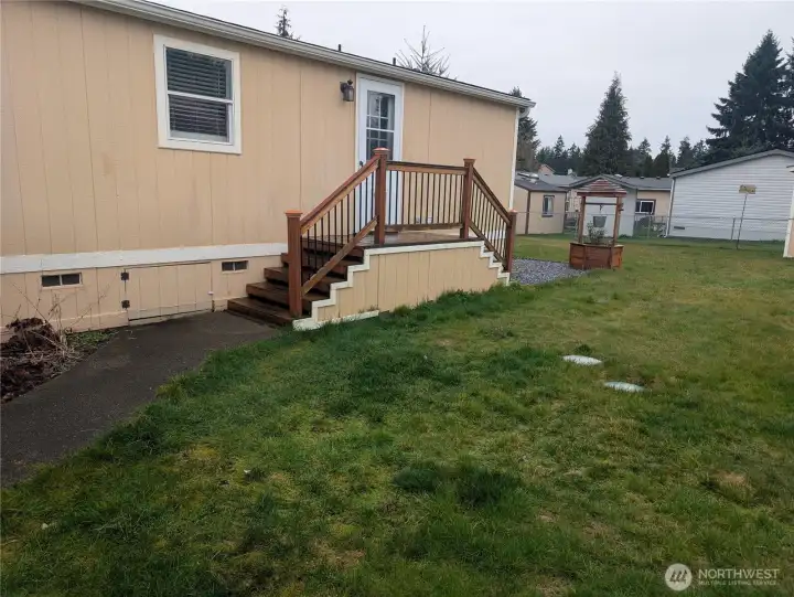 Showing backyard and back door.