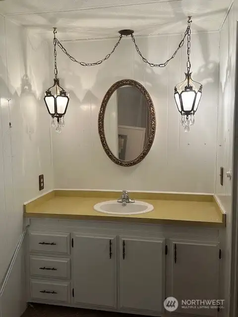 This is the en suite sink area which is set aside from the other part of the bathroom.