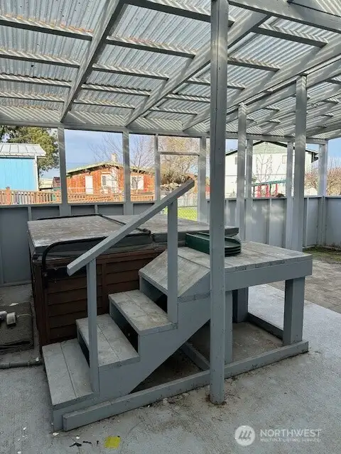 Hot tub area.  Status of tub is unknown.