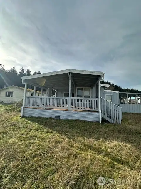 The view of the deck area at the back of the home.