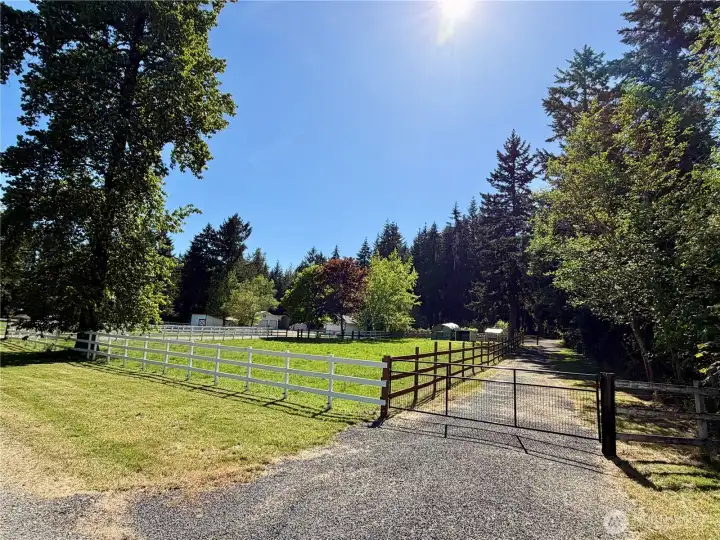Separate gated entry and driveway to the RV area