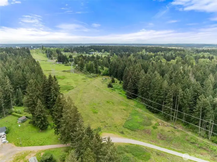 Separate 5 acre parcel. Good pasture land. Build? Run livestock? Lots of possibilities!
