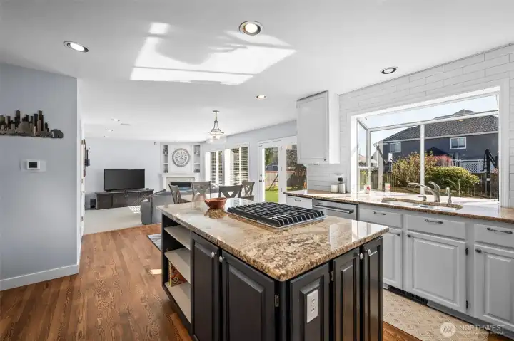 Kitchen with quartz counters and island