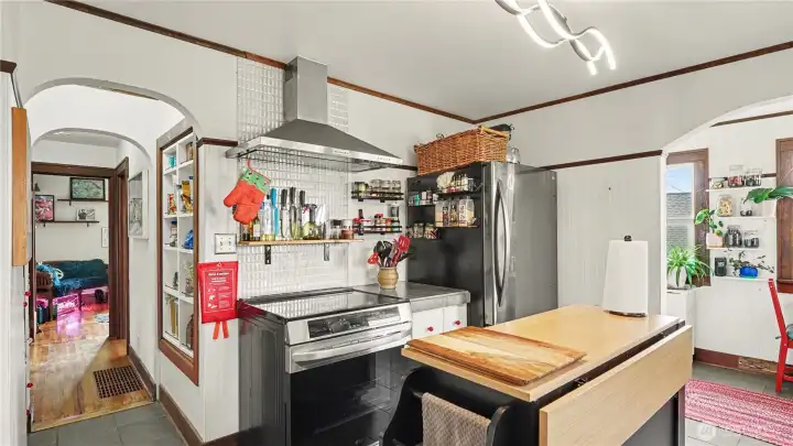 Kitchen is complete with stainless steel appliances.