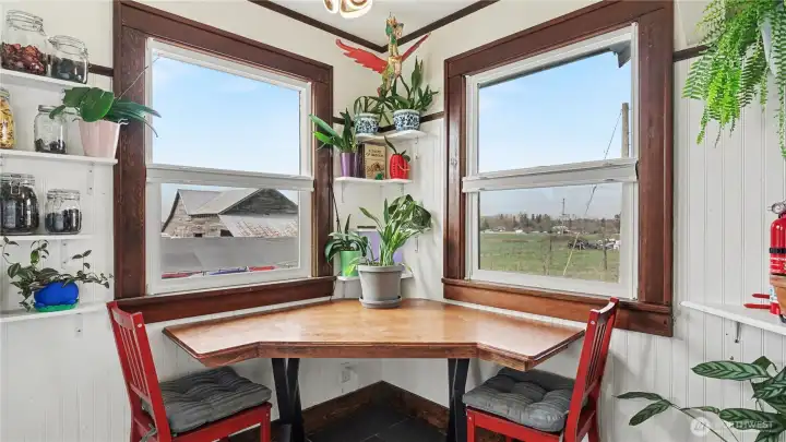 Corner dining nook with plenty of light!