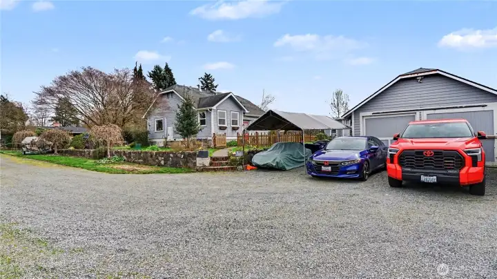 A detached two-car garage adds convenience and extra storage.