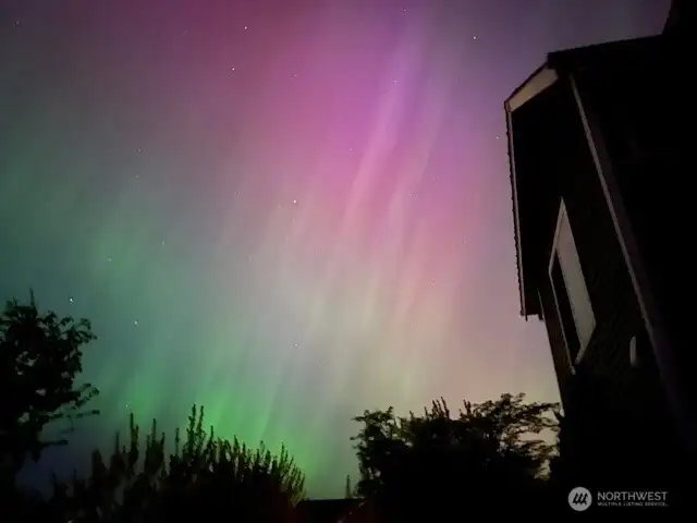 Northern Lights, right from your bedroom window! (photo taken by the owner)
