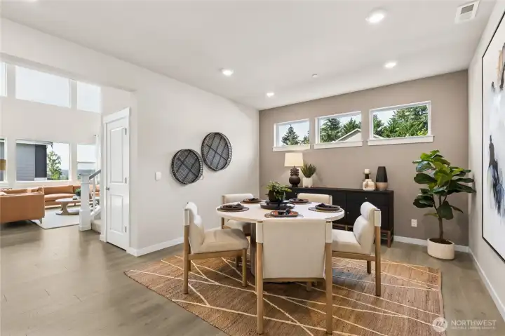 Photo rendering is representational and may be virtually staged. Actual home is under construction and finishes, elevation, and paint colors may vary. See site agent for details.