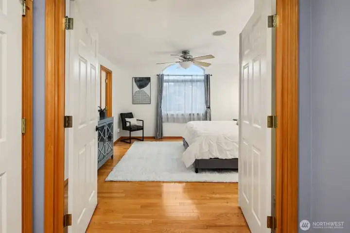 Double door entry into the primary suite with full bath and walk-in closet.