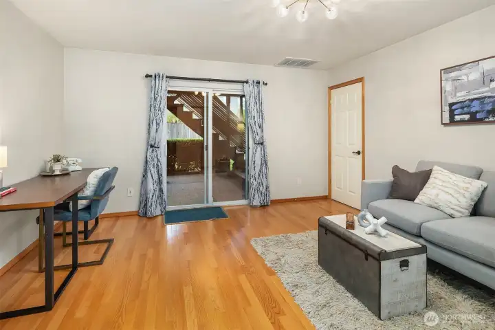 Flex den area on the lower level with a slider to the backyard deck and yard.