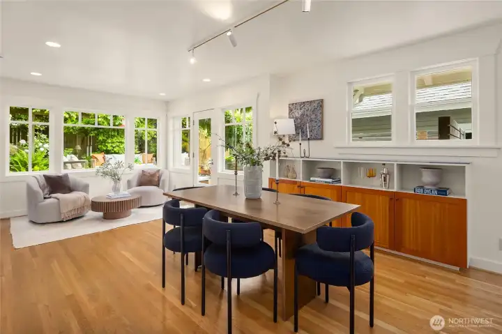 Dining area and sitting area connect seamlessly to the kitchen and patio. Dining area and sitting area connect seamlessly to the kitchen and patio.