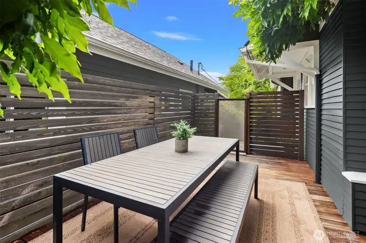 Private and enclosed Ipe Deck on side of home connects to dining area. Private and enclosed Ipe Deck on side of home connects to dining area.