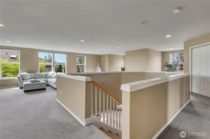 Loft area circles the staircase