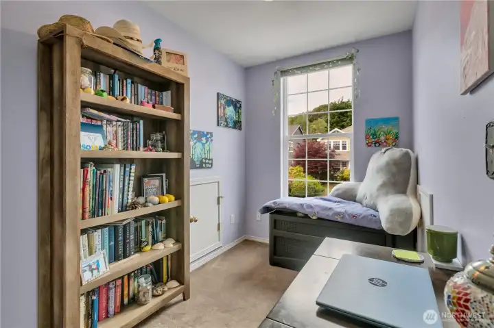Great reading nook in the bedroom dormer