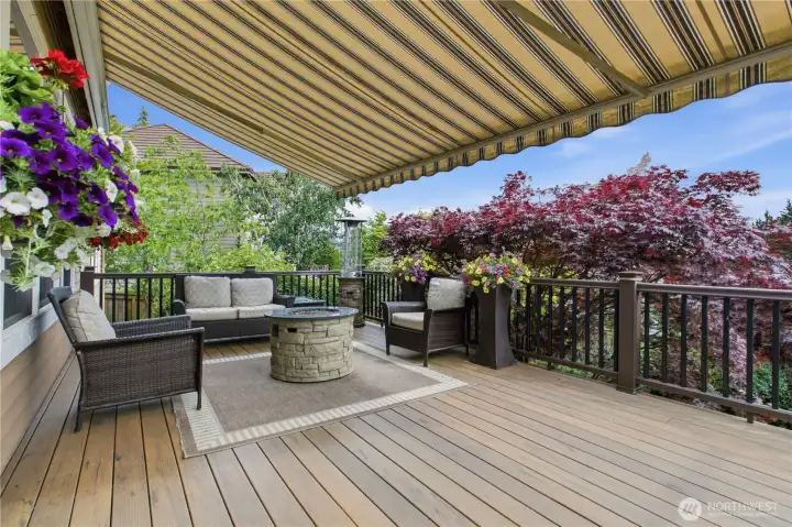 Retractable awning offers great outdoor space in rain or shine.