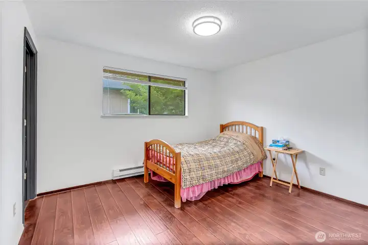 Primary bedroom with walk-in closet
