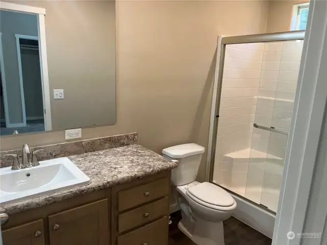 Primary bathroom with walk in shower.