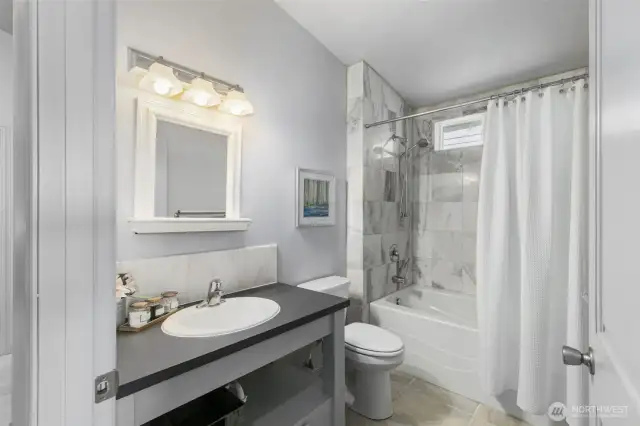 Main bathroom across from 2nd bedroom