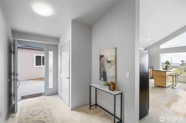 Wide entry to open floor plan to the views!