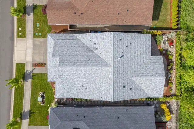 Beautifully landscaped and meticulously maintained. The light-colored roof keeps so much heat out of the home!