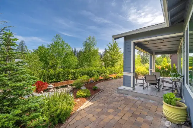 Expansive hardscape, and beautiful, mature landscaping. All with recently upgraded irrigation system. Generous covered porch with custom tile flooring is a lovely place to soak in the views.  Gas stub out for your BBQ.
