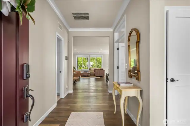 Sweeping Engineered hardwoods welcome you and your eyes are automatically drawn to the beautiful vistas awaiting you in the backyard.