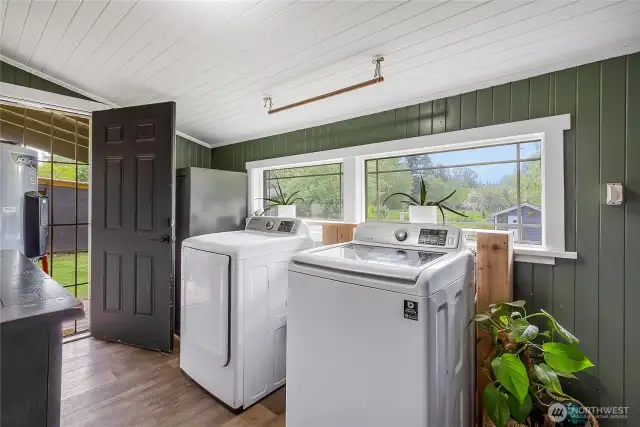 Laundry room with door to the backyard.