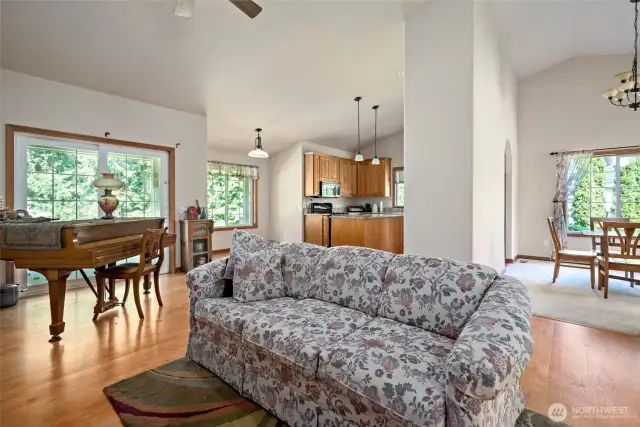 Family Room looking into kitchen nook, kitchen, and dining room
