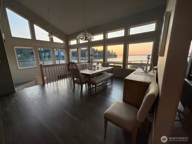 wake up to magnificent sunrises streaming through every window, filling the space with warmth and waterfront serenity