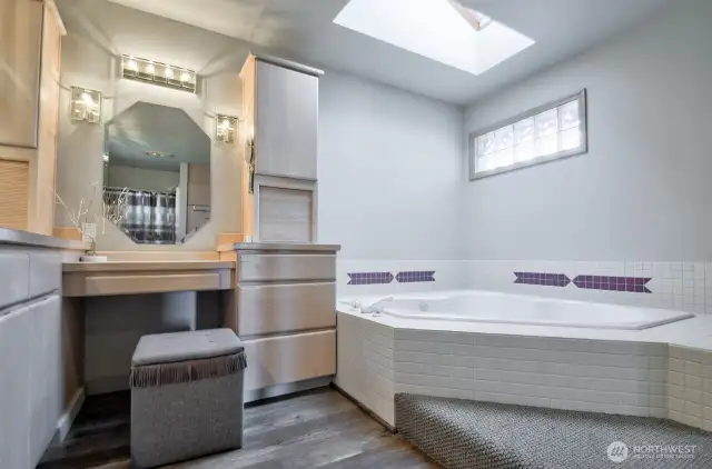 Soak in your spa-like retreat jetted soaking tub beneath a skylight, surrounded by peace, comfort and calming light