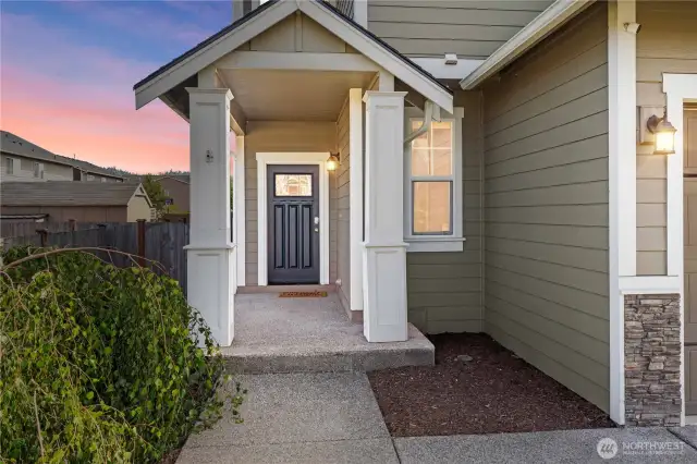 Entry of the home and covered porch.
