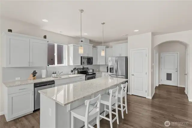 View of kitchen with bar space.