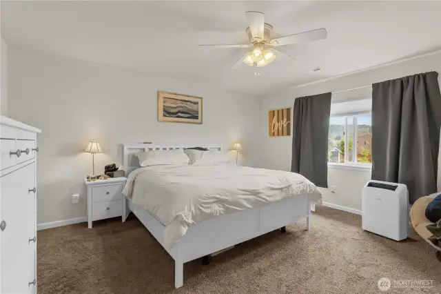The primary bedroom with large five-piece bathroom.