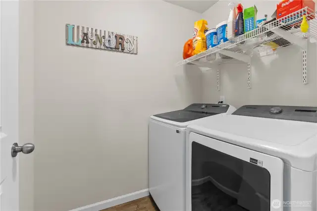 Utility room located on the second level of the home, outside of the bedrooms for quick access.