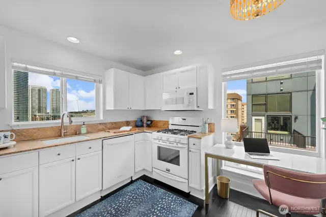 Kitchen with granite counters.