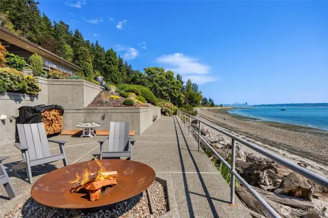 The Firepit seating area is located on the lower terrace closest to the beach and Seattle views.