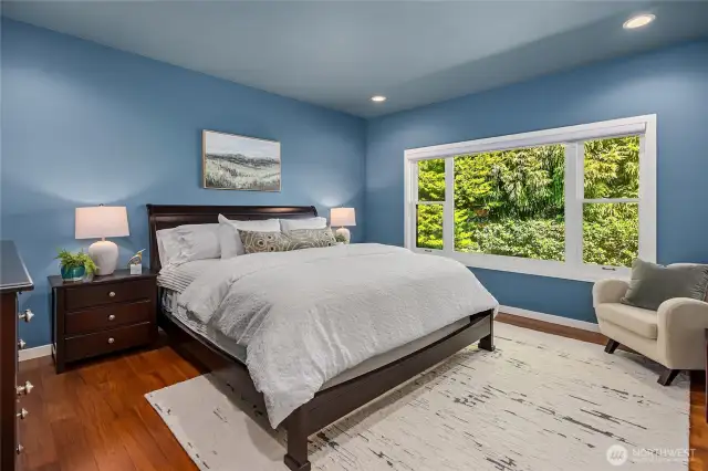 The guest wing features this lovely soothing bedroom and 3/4 bath. Pocket doors close off the the entire guest wing for optimal peace and privacy.