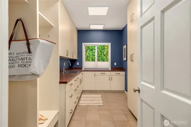 The mudroom offers tons of workspace and storage options for those Costco runs, while conveniently located adjacent to the 2-car garage.